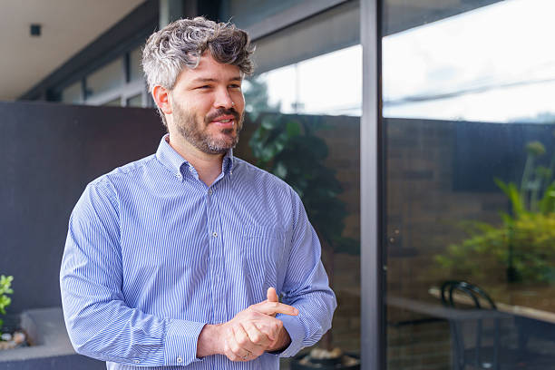 istock Latin businessman gesturing while speaking in a coworking space 2217143943
