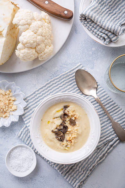 istock Vegetarian cauliflower soup with truffle and macadamia nuts 2217144272
