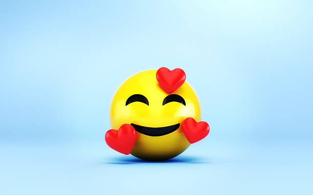 istock Smiling Face Emoji Icon with Heart on Soft Blue Infinite Background 2217150201