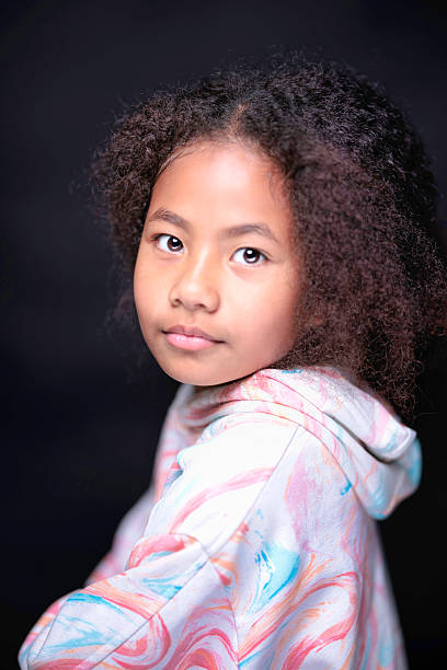 Seven-year-old Fijian girl photographed in a studio.
