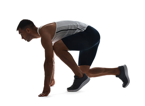 istock Sportsman in starting position for run on white background 2217153068