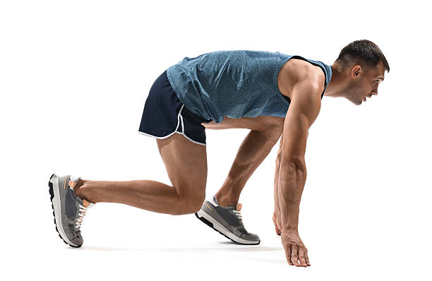 istock Sportsman in starting position for run on white background 2217153126