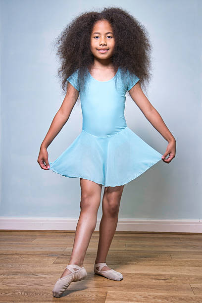 Seven-year-old Fijian girl dressed for ballet lessons.
