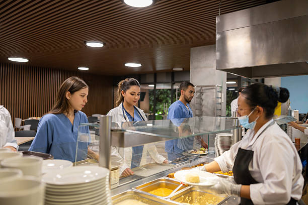 istock Doctors having lunch in the hospital's cafeteria 2217161747
