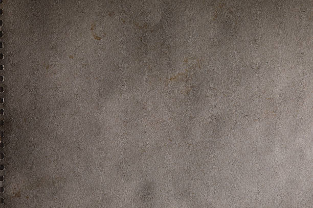Texture of worn dark grey rustic grunge paper material surface