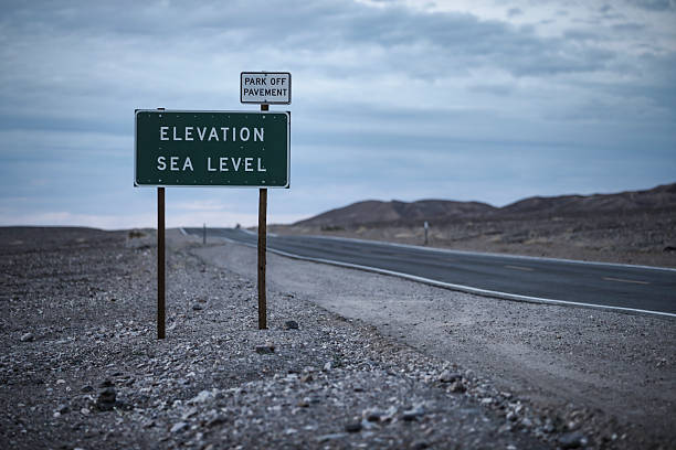 Death Valley National Park, California.  Sign along a major road marking sea level.