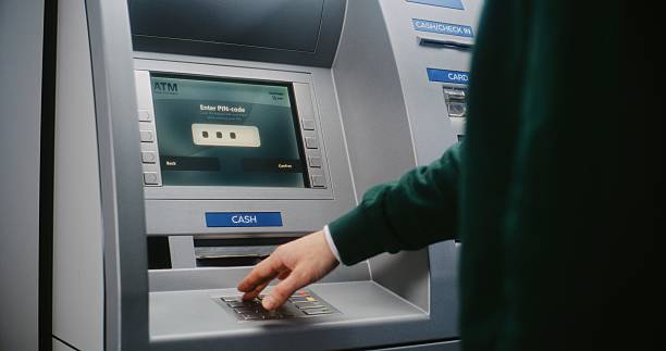 istock Unrecognizable Person Entering PIN Code. Error Message on Cash Machine Due to Incorrect PIN Code 2217182044