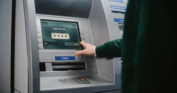 istock Unrecognizable Person Entering PIN Code. Error Message on Cash Machine Due to Incorrect PIN Code 2217182162