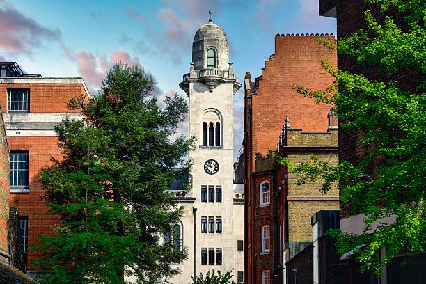 istock Historic clock tower in urban landscape 2217184442