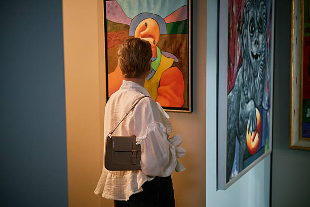 istock Observing Artwork in Modern Art Gallery Exhibition 2217186851