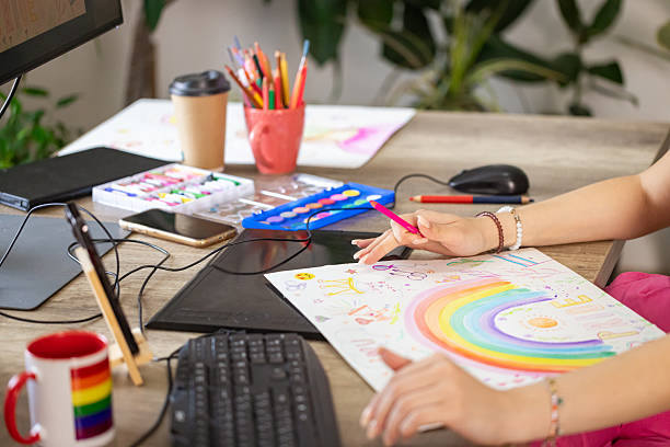 istock Woman Draws for Pride Event 2217189551