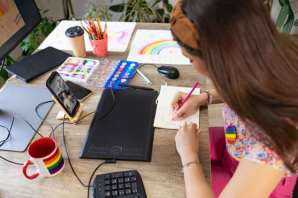 istock Woman Chats Online with Pride 2217189615