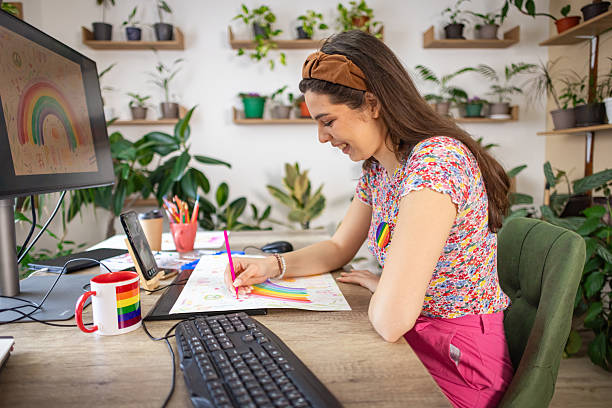 istock Woman Draws for Pride Event 2217190082
