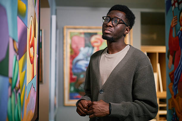 istock Admiring Modern Art in Contemporary Gallery 2217190529