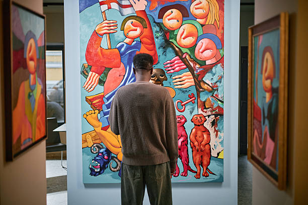 istock Observing Colorful Abstract Painting Display in Art Gallery 2217191262