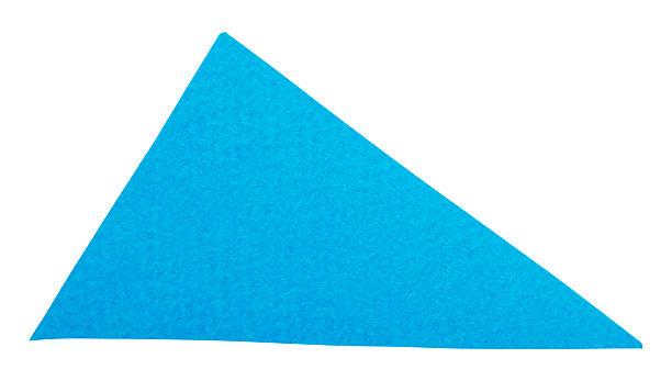 istock Blue triangle cut out of textured paper, simple geometric shape isolated 2217193708