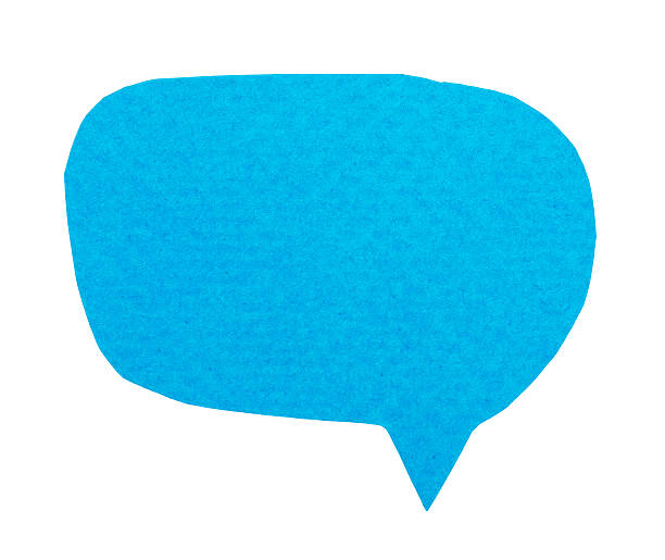 istock Speech bubble cut out of textured blue paper, isolated blank for design 2217193718