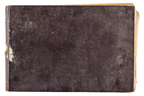 istock Old vintage grunge book in brown leather cover isolated element 2217195078