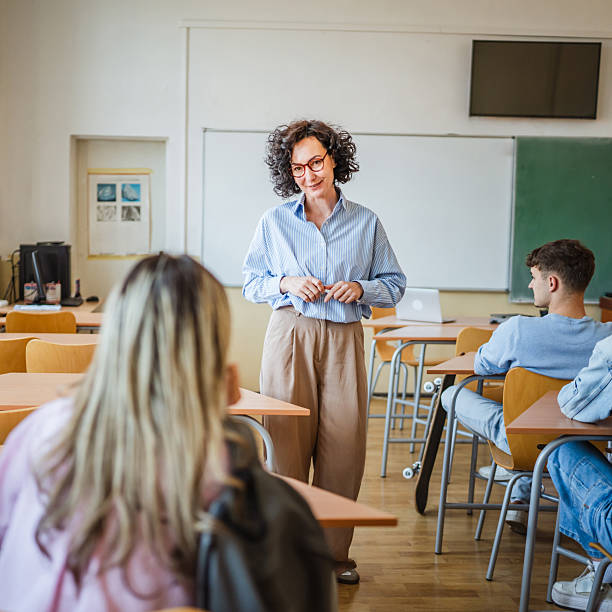 istock professor talk about lecture to high school students 2217195345