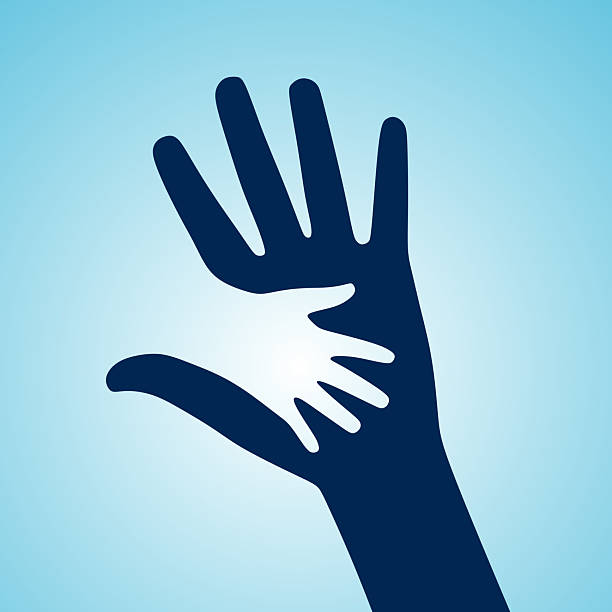 istock Silhouetted Parent and Child Hands Illustrating Care and Support on Blue Background 2217197489