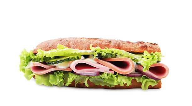 istock Baguette sandwich with ham isolated on white 2217199209