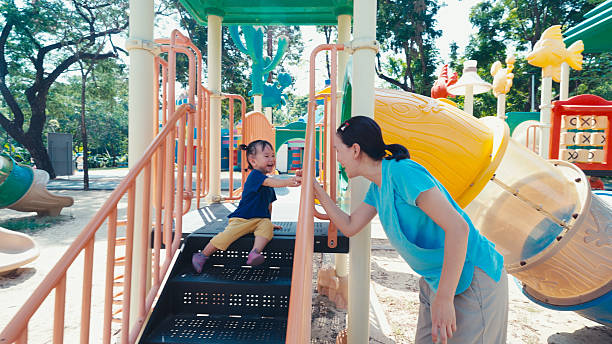 istock Kids having a good time in the park 2217199954