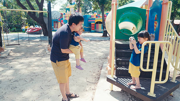 istock Kids having a good time in the park 2217199986