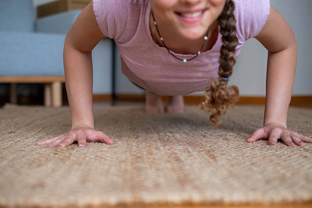 istock The teenager is training, doing push-ups 2217200936