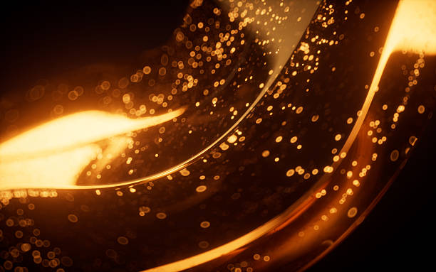 istock Golden glowing particles in glass geometry, 3d rendering. 2217203382