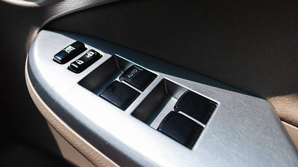 istock Power window control switch car interior detail image modern vehicle close-up view automotive technology 2217209149