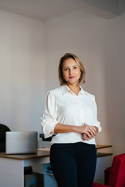 istock Woman standing in office 2217210509