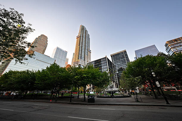 Large office buildings tower over the downtown of Louisville Kentucky. Soft colors and muted sky for copy.