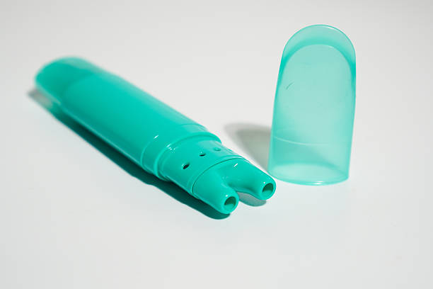 istock Green double inhaler isolated on white background 2217223018