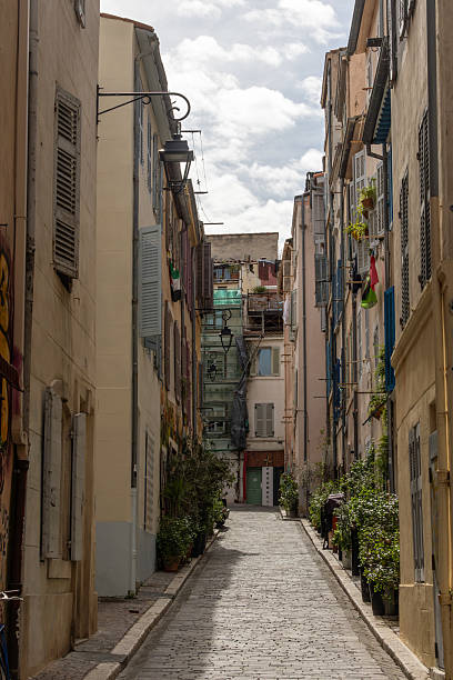Marseille, France March 15, 2025 Old houses in narrow alleys in the Le Panier district.
