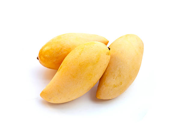 istock Ripe sweet yellow mango fruits on white 2217225370
