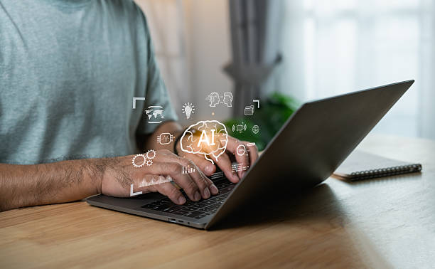 istock Person working on laptop with artificial intelligence concept, hands typing, casual setting, technology in focus, brainstorming ideas, creative process 2217225881