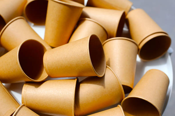 istock Brown paper cups on white background. 2217226389