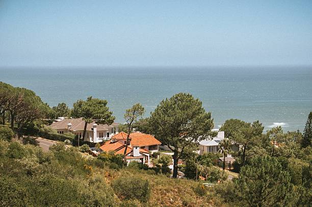 istock Scenic coastal view with ocean and houses. 2217228946