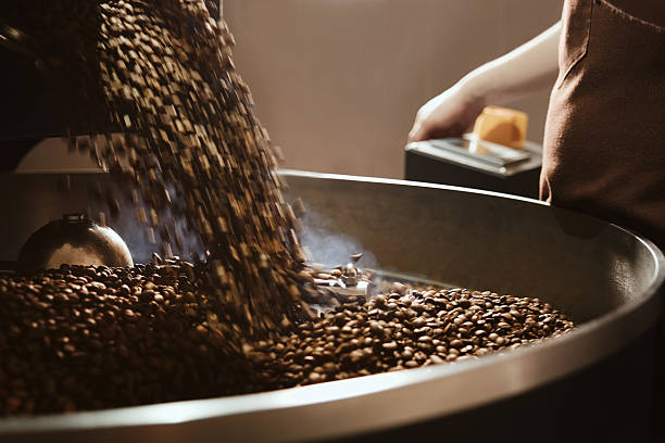 istock The Artisans in a Coffee Shop Engage in Coffee Roasting Process 2217229892
