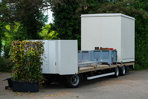 istock Trailer with storage units parked near greenery in urban setting 2217241800