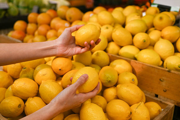istock Choosing lemon in farmer's market 2217247808