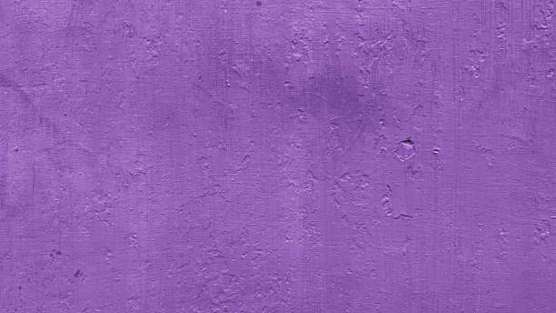 istock full frame of purple painted wall textre background, blank background for copy space or web banner 2217248184