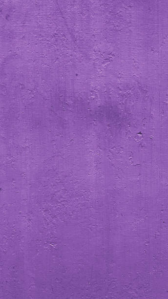 istock full frame of purple painted wall textre background, blank background for copy space or web banner 2217248191