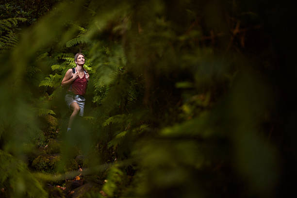 istock Smiling female hiker among greenery in nature. 2217248350
