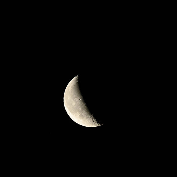 istock Growing hump, third quarter moon, astrophotography of night sky objects 2217249784