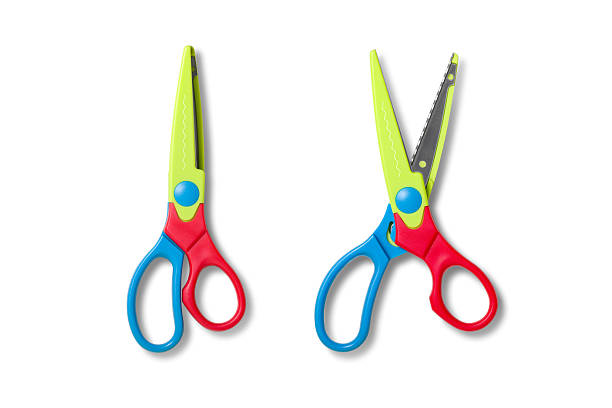 Set of colorful zigzag scissors for kids, decorative pattern scissors, children's craft scissors, isolated on a white background. High resolution.