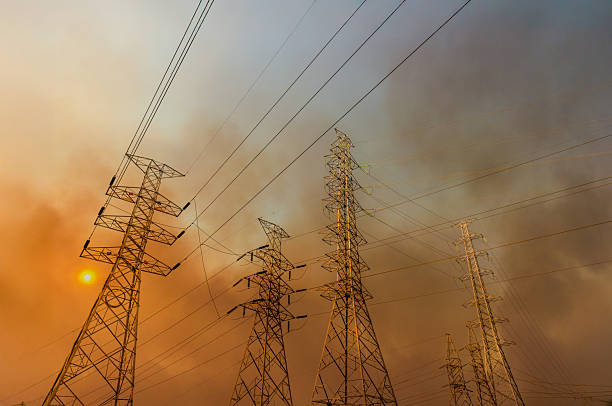 istock Wildfire is burning near power transmission tower line. 2217258460