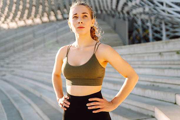 istock Fit woman in shape exercising outdoors.  Active lifestyle. 2217260144