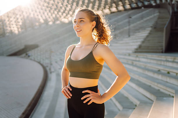 istock Fit woman in shape exercising outdoors.  Active lifestyle. 2217260157