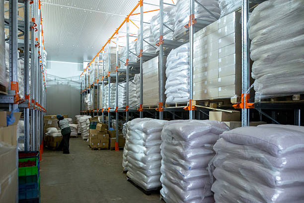 istock A cold storage warehouse for food products frozen using the shock-freezing method. The products are packaged in bags and boxes and placed on wooden pallets for organized storage and distribution. 2217270900